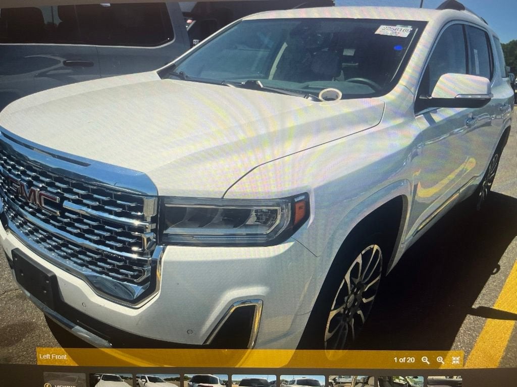 2023 GMC Acadia Denali in Summit White — front three-quarter view