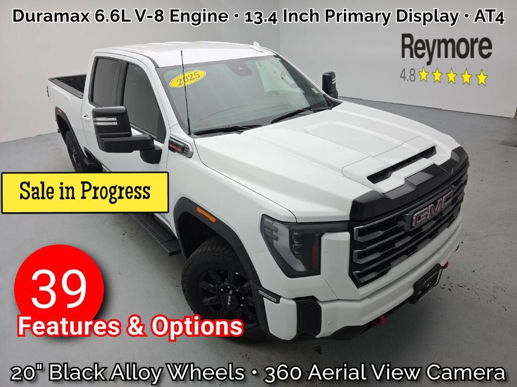 2025 GMC Sierra 2500 HD AT4 in Summit White — front three-quarter view