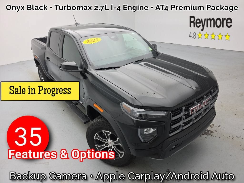 2025 GMC Canyon AT4 in Onyx Black — front three-quarter view