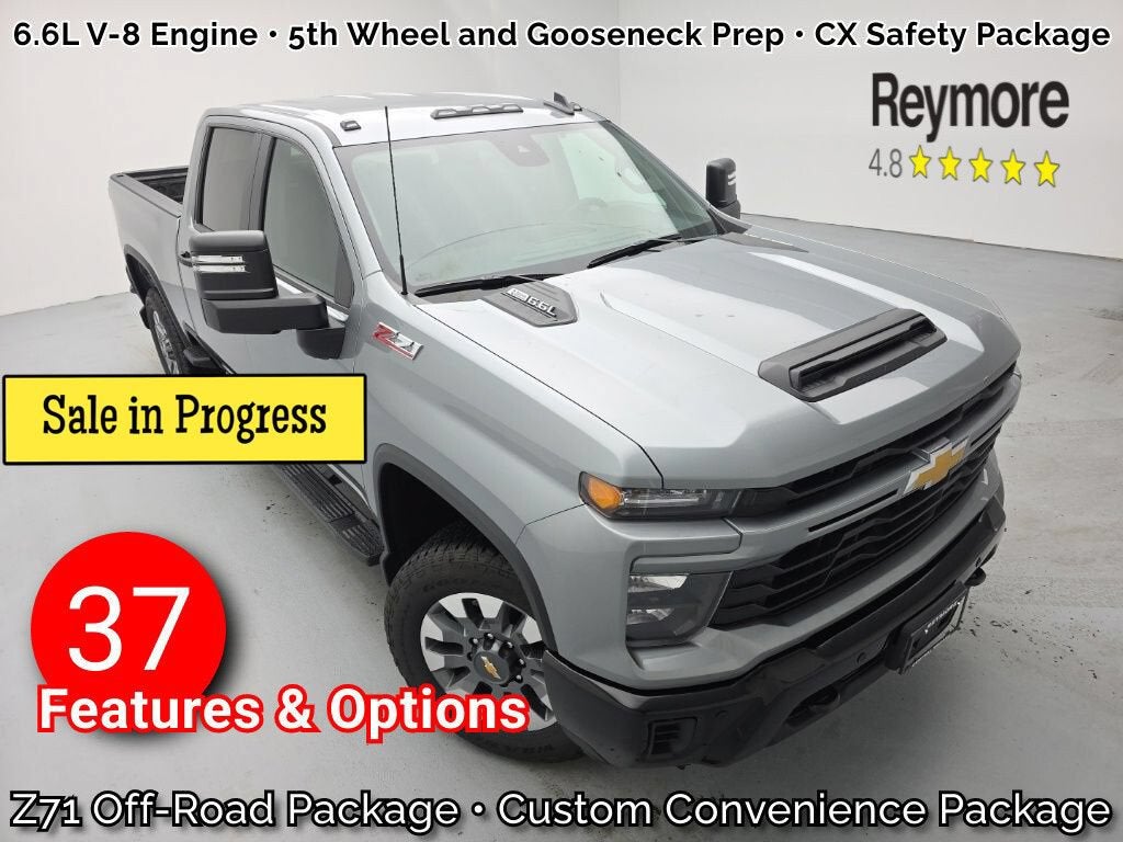 2026 Chevrolet Silverado 2500 HD Custom in Sterling Gray Metallic — front three-quarter view
